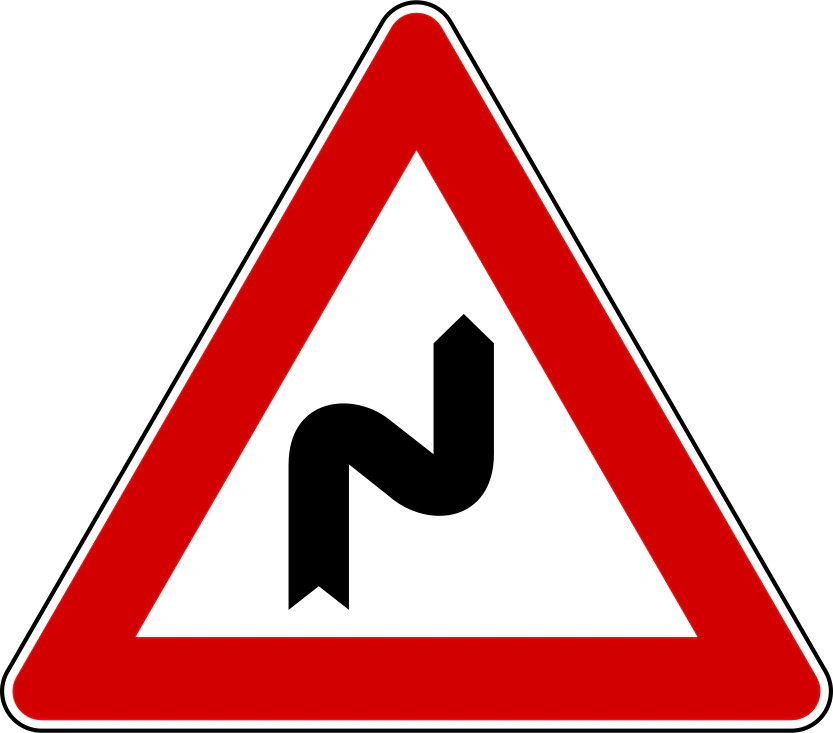 IT-W-06 - Double bend, first to right road sign